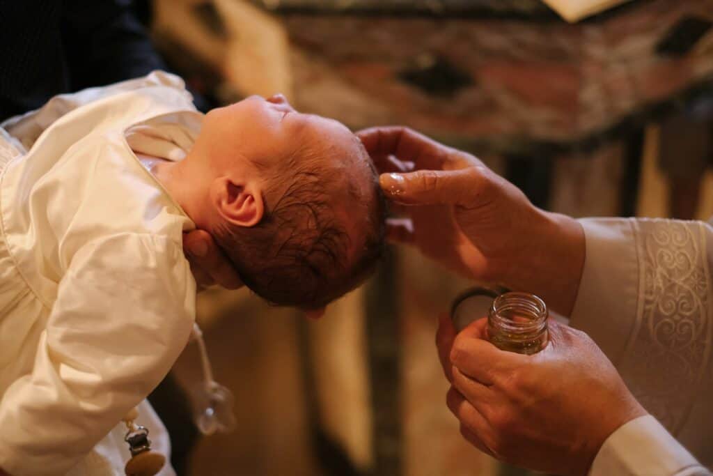 A baby is being baptized